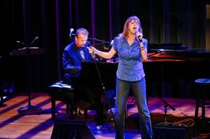 Tina Walsh, accompanied by Philip Fortenberry on the piano, sings a piece at The Composers Showcase at the Cabaret Jazz at The Smith Center, Wednesday Aug. 8, 2012.
